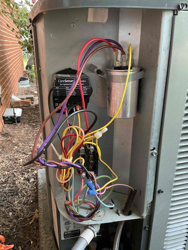 Completed preventative maintenance on 6-year-old Amana air conditioning system. Performed standard tune-up procedures including inspection of indoor furnace unit and outdoor condensing unit, verified electrical connections and capacitor operation, checked CoreSense diagnostic monitor functionality, and confirmed all components operating within normal parameters.