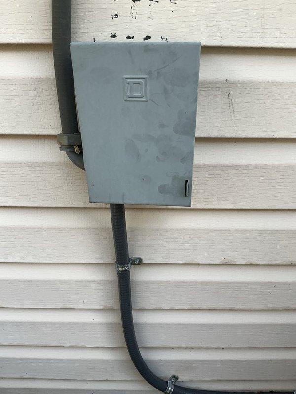 Completed routine maintenance on 3-year-old packaged air conditioning unit. Inspected condenser coils and found heavy accumulation of dust and debris restricting airflow; cleaned coil surfaces to restore proper heat transfer efficiency. Checked drain pan for proper drainage, noted moisture staining and sediment buildup. Verified electrical connections at outdoor disconnect box and confirmed all components operating within normal parameters.