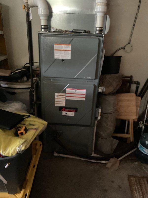 Conducted comprehensive HVAC system evaluation for equipment replacement estimate following possible recall notice. Assessed existing Trane outdoor condensing unit and indoor furnace system, documenting current equipment specifications, installation configuration, and operational status. Photographed both indoor and outdoor components to provide detailed visual documentation for replacement proposal and equipment sizing calculations.