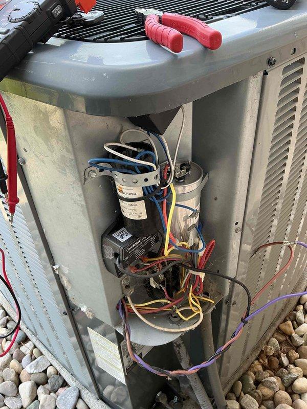 Responded to no cooling call at commercial salon location. Upon arrival, found air conditioning system not providing cooling to entire facility. Performed diagnostic evaluation of outdoor condensing unit. Removed access panel and inspected electrical components including dual run capacitor, contactor, and associated wiring connections. Tested capacitor for proper microfarad readings and voltage. Verified all wire terminations were secure at capacitor terminals and contactor. Checked contactor operation and coil functionality. Inspected control board and relay components for proper operation. All electrical connections tested and found to be within manufacturer specifications. System cycled properly during testing phase. Completed routine maintenance service while on site, including cleaning condenser coil, checking refrigerant pressures, and verifying proper amperage draw on compressor and fan motor. System restored to normal cooling operation. Left unit operational with all access pan