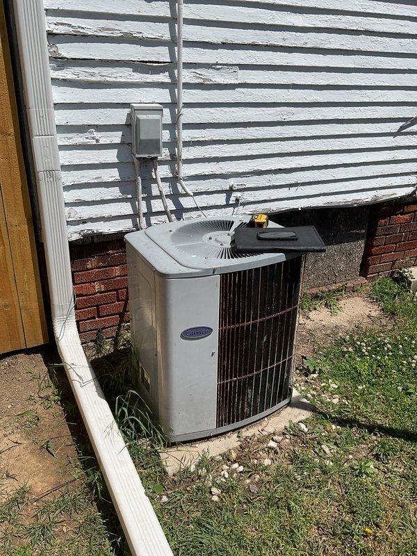Conducted on-site evaluation for complete HVAC system replacement at residential property. Assessed existing outdoor condensing unit positioned on concrete pad adjacent to building exterior with electrical disconnect box, and indoor Concord furnace installation in basement mechanical room with associated ductwork and ventilation components. Provided comprehensive replacement estimate for new air conditioning system to address customer's cooling needs.
