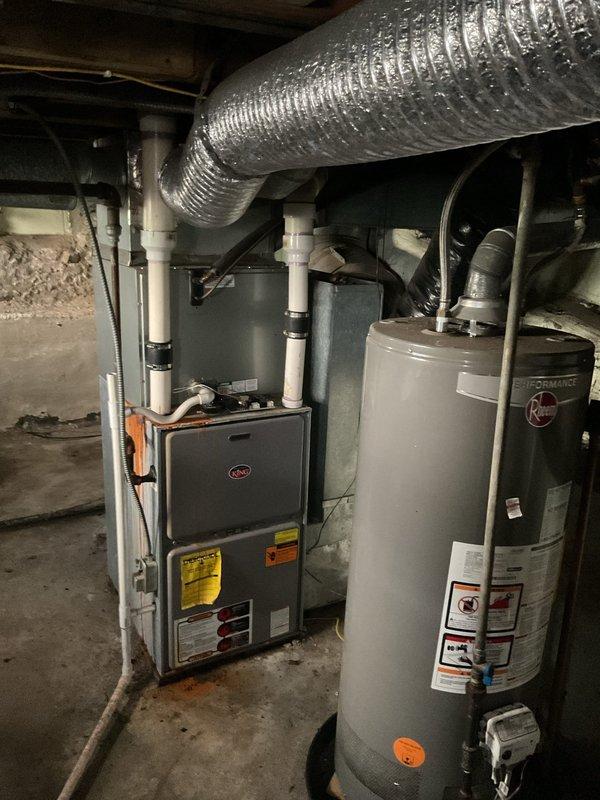 Conducted on-site assessment of existing HVAC system in basement mechanical room to provide replacement estimate for air conditioning equipment. Documented current furnace installation, ductwork configuration, and spatial layout for proper equipment sizing and replacement planning. Coordinated with property owner remotely regarding system specifications and replacement options, as landlord was unavailable for in-person consultation during evaluation.