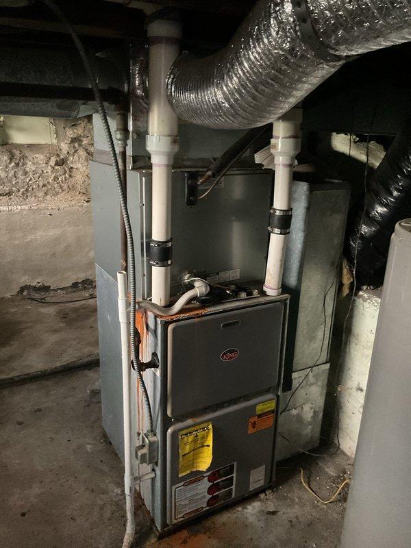 Conducted on-site assessment of existing HVAC system in basement mechanical room to provide replacement estimate for air conditioning equipment. Documented current furnace installation, ductwork configuration, and spatial layout for proper equipment sizing and replacement planning. Coordinated with property owner remotely regarding system specifications and replacement options, as landlord was unavailable for in-person consultation during evaluation.