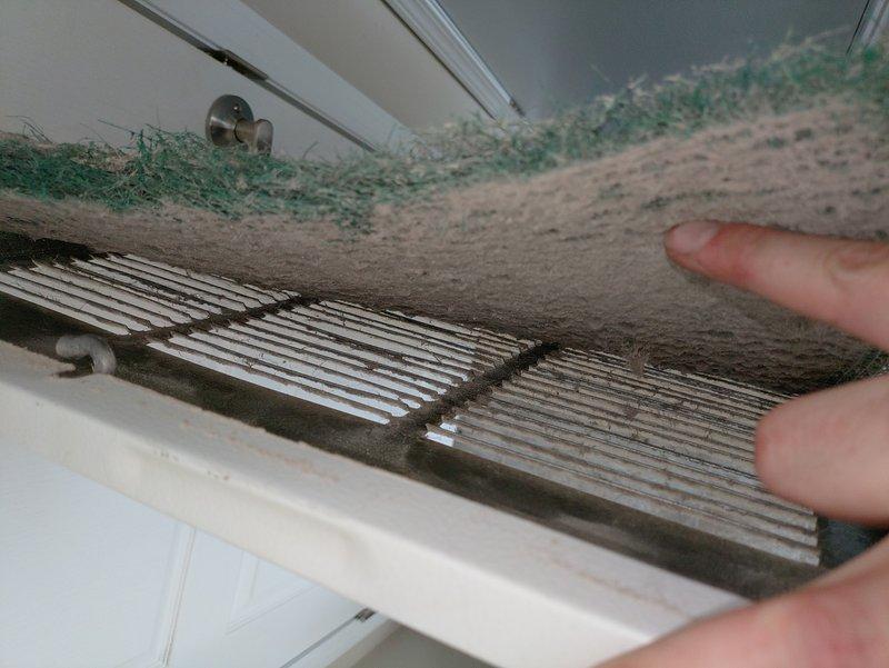 Responded to service call for 2-year-old A/C unit with reduced airflow. Upon inspection, discovered severely clogged return air filter with heavy dust, debris, and pet hair accumulation restricting system airflow. Replaced dirty filter with new filter, restoring proper airflow and system performance. Inspected HVAC equipment in utility closet, confirmed all mechanical components, gas connections, and electrical wiring operating within normal parameters. Discussed thermostat upgrade options with customer per their request.