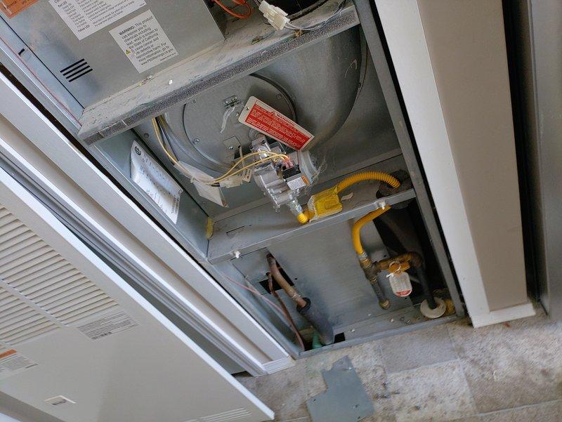 Responded to service call for 2-year-old A/C unit with reduced airflow. Upon inspection, discovered severely clogged return air filter with heavy dust, debris, and pet hair accumulation restricting system airflow. Replaced dirty filter with new filter, restoring proper airflow and system performance. Inspected HVAC equipment in utility closet, confirmed all mechanical components, gas connections, and electrical wiring operating within normal parameters. Discussed thermostat upgrade options with customer per their request.