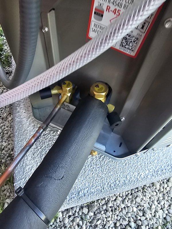 Completed full HVAC system installation including downflow air conditioning unit with matching evaporator coil package. Installed new outdoor condensing unit on composite equipment pad with gravel base for proper drainage and stability. Ran new copper lineset with appropriate insulation to connect outdoor unit to indoor coil. Mounted Concord-branded downflow furnace with integrated coil in mechanical closet. Installed new electrical disconnect box at outdoor unit per code requirements. Terminated refrigerant lines with brass fittings and service valves, properly labeled with R-410A refrigerant specifications. Installed new programmable thermostat and completed all necessary electrical connections. System tested, charged to manufacturer specifications, and verified operational.