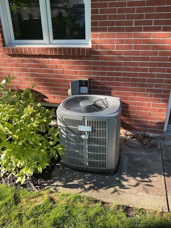 Completed scheduled air conditioning maintenance on residential outdoor condensing unit. Performed comprehensive system inspection, verified proper operation of compressor and fan motor, cleaned condenser coils, checked refrigerant levels, and tested electrical connections at disconnect box. Unit operating within normal parameters upon completion of service.