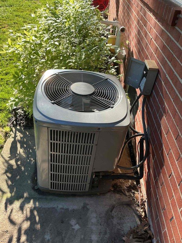 Completed scheduled air conditioning maintenance on residential outdoor condensing unit. Performed comprehensive system inspection, verified proper operation of compressor and fan motor, cleaned condenser coils, checked refrigerant levels, and tested electrical connections at disconnect box. Unit operating within normal parameters upon completion of service.