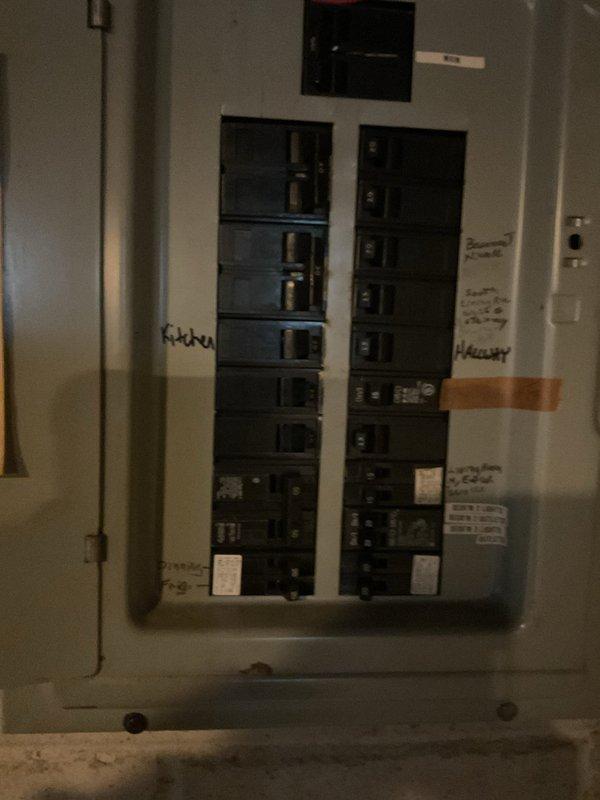 Conducted on-site evaluation for mini-split system installation in basement utility area. Assessed existing electrical panel capacity and circuit availability to support new mini-split equipment, noting current breaker configuration and available space for dedicated circuit installation. Evaluated proposed installation location, documenting current conditions including storage area layout, existing HVAC ductwork, and wall surfaces for indoor unit mounting considerations. Photographed electrical infrastructure and installation area to prepare comprehensive estimate for mini-split system installation including required electrical work and equipment placement.