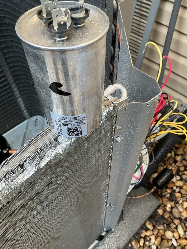 Completed comprehensive AC tune-up service on outdoor condensing unit. Inspected and tested electrical components including capacitor, verified proper connections and terminal integrity, and documented system condition with photos. Discussed preventative maintenance plan options to include AC coverage for ongoing system reliability.