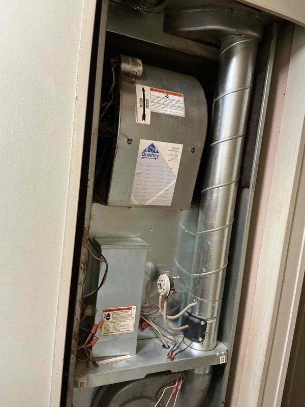 Responded to service call for Revolv AC system unable to maintain set temperature. Upon arrival, verified system was running but experiencing insufficient cooling capacity. Performed comprehensive system diagnostics including visual inspection of indoor air handler and outdoor condensing unit. Checked refrigerant levels, electrical connections, and airflow parameters. System showed normal operation of compressor and blower motor with no apparent mechanical failures. Documented equipment condition with photos of both indoor and outdoor components for service records.