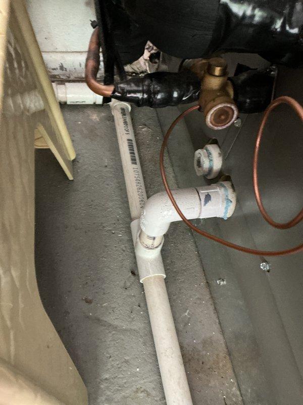 Completed air conditioning tune-up on 3-year-old system and replaced Aprilaire 600M humidifier evaporator pad, which showed mineral buildup and discoloration from normal use. All system components inspected and operating within normal parameters.