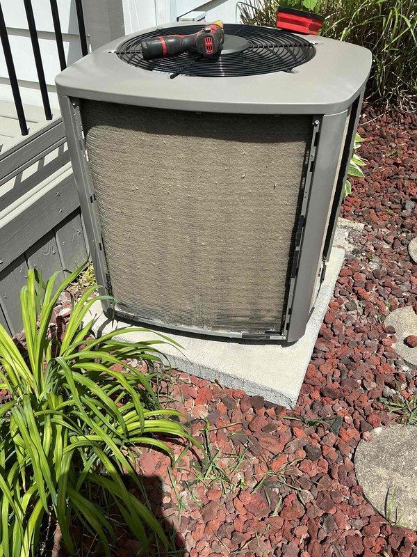 Responded to service call for 4-year-old air conditioning system not cooling optimally. Performed diagnostic inspection of outdoor condensing unit, accessed internal components through front panel, and evaluated system performance. Completed necessary maintenance procedures to restore proper cooling efficiency and system operation.