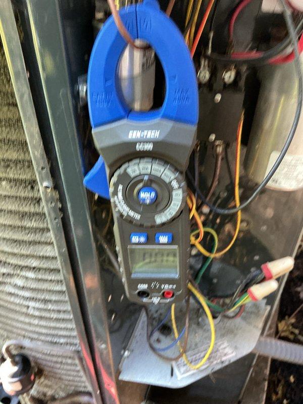 Completed preventative maintenance on two 3-year-old air conditioning systems. Performed electrical diagnostics using clamp meter to verify proper amperage draws on both units, inspected condenser coils and refrigerant lines, and assessed outdoor unit installations including drainage areas and clearances around equipment.
