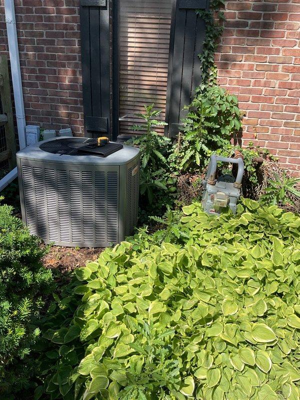Conducted comprehensive assessment of existing Lennox HVAC system for complete air conditioning replacement. Evaluated current indoor furnace and evaporator coil assembly located in basement mechanical room, noting configuration with existing condensate drainage and refrigerant line routing. Inspected outdoor condenser unit positioned on concrete pad against exterior brick wall, assessing clearances and landscaping considerations for replacement installation. Documented system specifications, electrical requirements, and existing infrastructure including PVC condensate piping and refrigerant line sets. Provided detailed estimate for new air conditioning system replacement including indoor and outdoor components, ensuring proper sizing and compatibility with existing ductwork and electrical service.