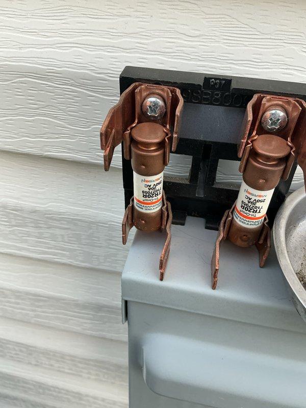 Completed scheduled cooling maintenance on a 5-year-old air conditioning system. During inspection, discovered a damaged fuse in the exterior disconnect box with a bent metal tab, which was replaced to ensure proper electrical protection and system safety. Performed routine maintenance procedures including system evaluation and equipment inspection of the outdoor condensing unit.