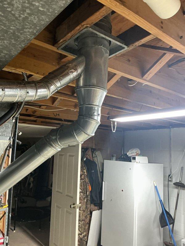 Responded to service call for 20+ year old AC unit with insufficient cooling performance. Conducted system inspection and diagnostics in basement/utility area where HVAC equipment is located. Evaluated ductwork configuration, air handler unit, and associated mechanical components to identify cooling deficiency. Military discount applied to repair services per customer request.