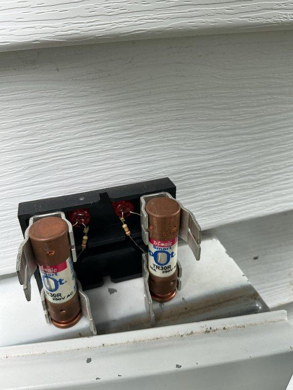 Completed annual preventative maintenance on a one-year-old heat pump system located on the side of the property. Performed comprehensive system diagnostics using refrigerant manifold gauges, verified operating pressures and temperatures were within manufacturer specifications, inspected electrical components including fuses and contactors, confirmed proper refrigerant line insulation and securing, and documented all findings with photographic evidence.