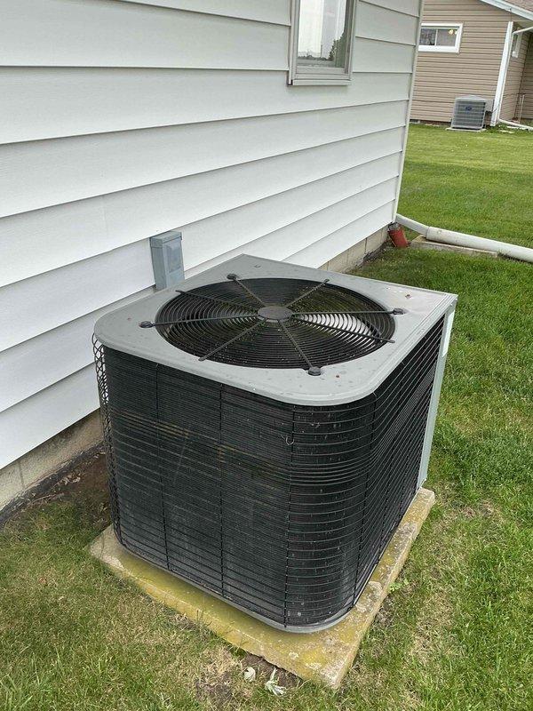 Completed comprehensive tune-up and preventive maintenance on 5-year-old residential split system air conditioning unit. Performed standard inspection of outdoor condenser unit and indoor Lennox air handler, verified proper operation of all components, and documented system condition with photographs for service records.