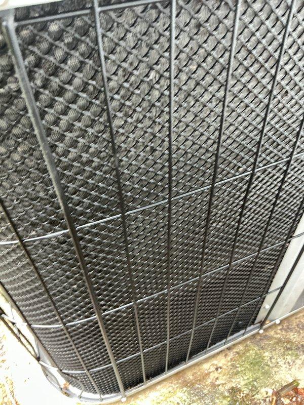 Completed annual maintenance on a 14-year-old air conditioning system. Performed visual inspection of outdoor condenser unit, verifying coil cleanliness and protective grille integrity. Measured electrical amperage at the unit using clamp meter to confirm proper system operation and component performance within manufacturer specifications.