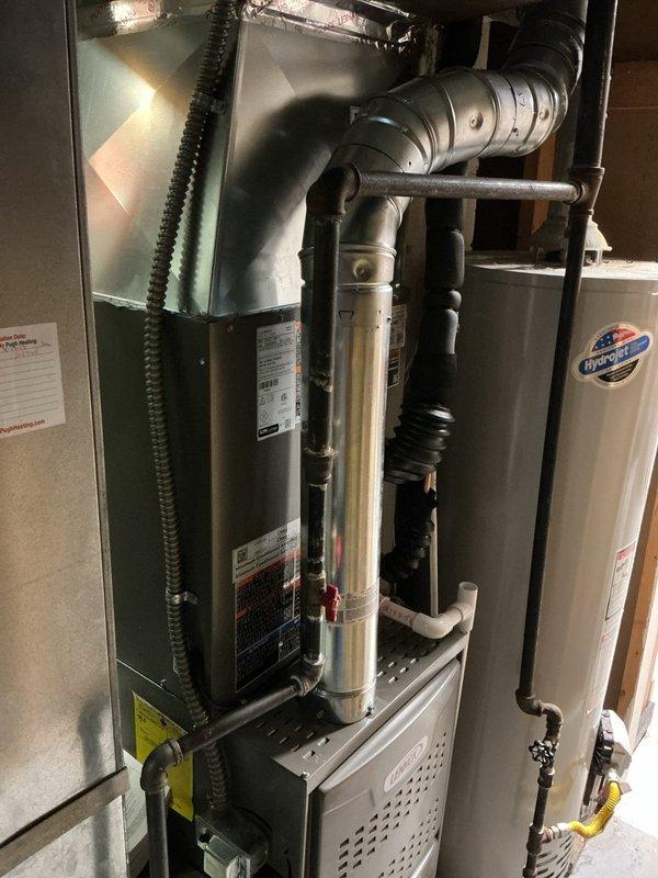 Completed full HVAC system installation including an 80% efficiency upflow gas furnace with corresponding upflow cased evaporator coil. Installed 5-inch filter rack for enhanced air filtration and condensate pump to manage drainage from the cooling system. Ran new refrigerant lineset between outdoor condensing unit and indoor coil, ensuring proper insulation and routing. Set new concrete pad for outdoor unit placement and installed electrical disconnect box with whip for code-compliant power connection. Mounted new programmable thermostat and completed all necessary wiring. Verified proper leveling of furnace unit using precision tools to ensure optimal operation and drainage. Tested all system components including gas connections, electrical circuits, refrigerant charge, and airflow. System is operational and performing to manufacturer specifications.