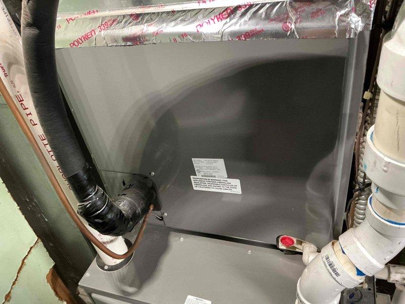 Completed comprehensive tune-up and maintenance on 10-year-old residential air conditioning system that had not been operated since last season. Performed full system inspection of outdoor condenser unit and indoor air handler, checked refrigerant levels, cleaned condenser coils, verified electrical connections, tested thermostat operation, and inspected condensate drain system. System tested successfully and confirmed operational with all components functioning within normal parameters.