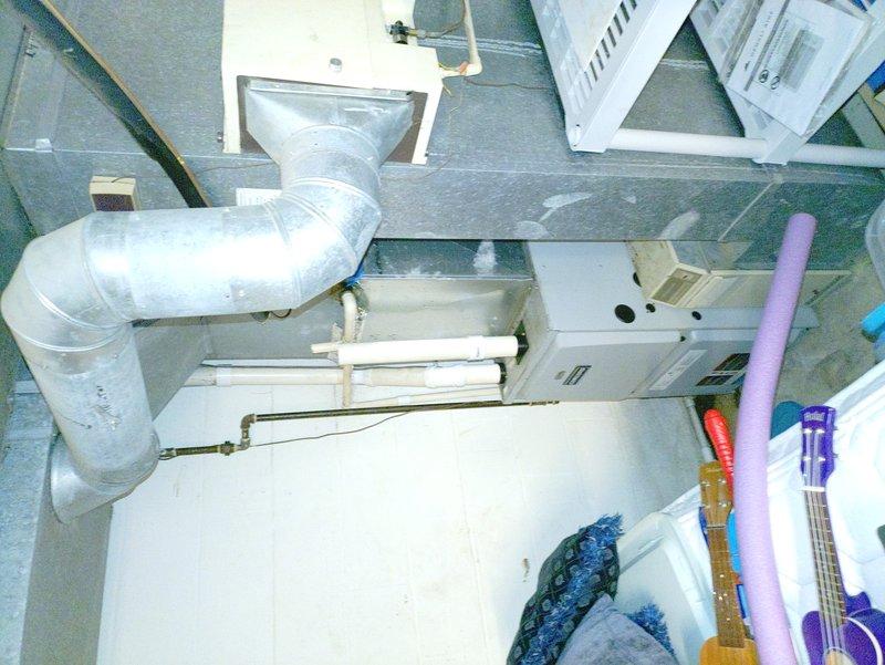 Completed comprehensive cooling system tune-up and maintenance on residential HVAC unit estimated to be over 15 years old. Performed standard preventative maintenance procedures including inspection of outdoor condensing unit, indoor air handler located in attic space, and associated ductwork and ventilation components. System assessed for proper operation and all accessible components documented photographically for service records.
