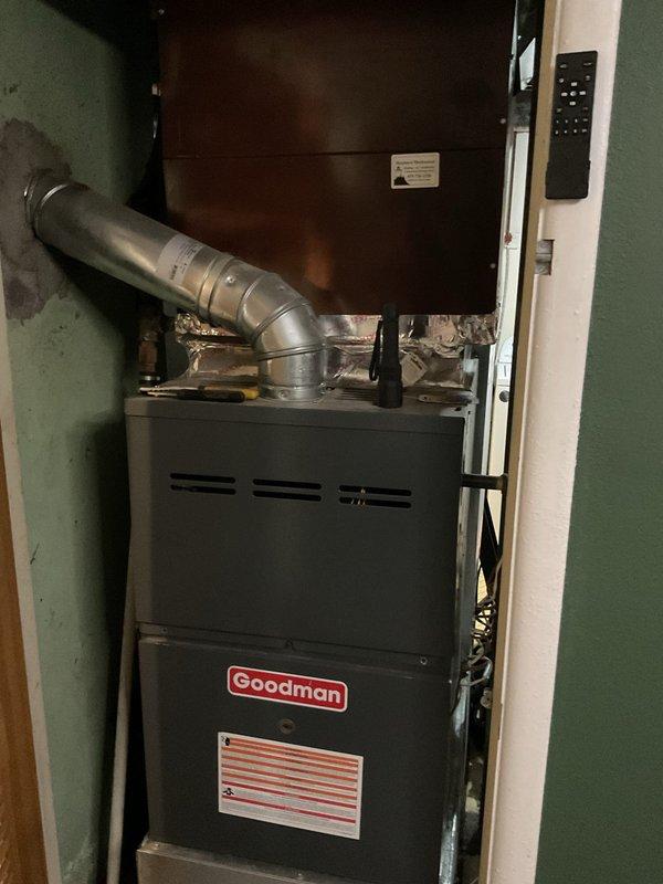 Responded to service call for non-operational air conditioning system. Performed comprehensive assessment of existing HVAC equipment, including Goodman furnace unit installed in interior utility closet and outdoor condensing unit located at building exterior. Documented current system configuration and equipment condition through detailed photography. Prepared complete replacement estimate for new air conditioning system to restore cooling functionality to the residence.