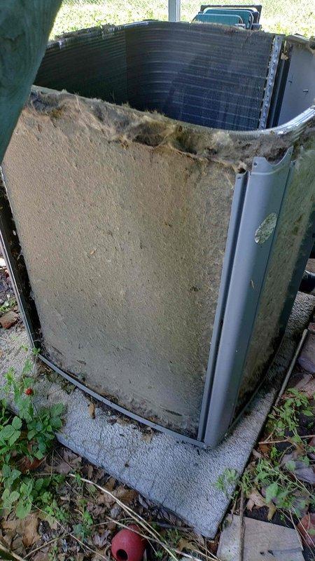 Completed AC tune-up on residential cooling system. Upon arrival, discovered outdoor condensing unit in severely deteriorated condition with extensive cabinet corrosion, significant panel damage, and compromised casing exposing internal condenser coil components. Exterior housing showed advanced rust, metal fatigue, and structural failure requiring immediate attention for safety and operational integrity. Inspected indoor air handler components and ductwork, documenting ceiling joist area and surrounding conditions. Unit operational status compromised due to exterior damage allowing debris infiltration and potential electrical hazards. Recommended cabinet replacement and comprehensive system evaluation to prevent further deterioration and ensure continued safe operation.