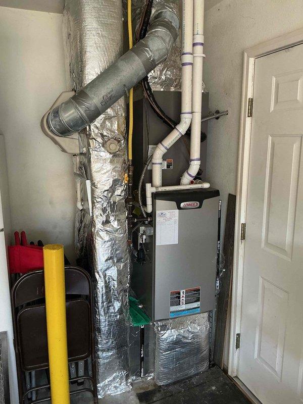 Completed scheduled cooling and heating maintenance on a 4-year-old HVAC system. Performed comprehensive inspection of the Lennox furnace and air handler unit, verified proper operation of all components, checked ductwork connections and insulation integrity, inspected PVC condensate drain lines and mounting brackets, and confirmed system is operating within manufacturer specifications for the upcoming season.