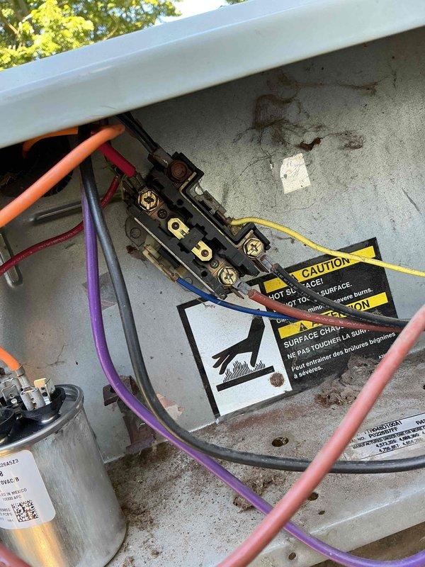 Responded to no cooling call and diagnosed failed compressor in outdoor condensing unit. Inspected electrical components including contactor and capacitor, documented system condition with photos showing weathered outdoor unit housing and interior basement HVAC installation. Provided estimate for compressor replacement to restore cooling operation.