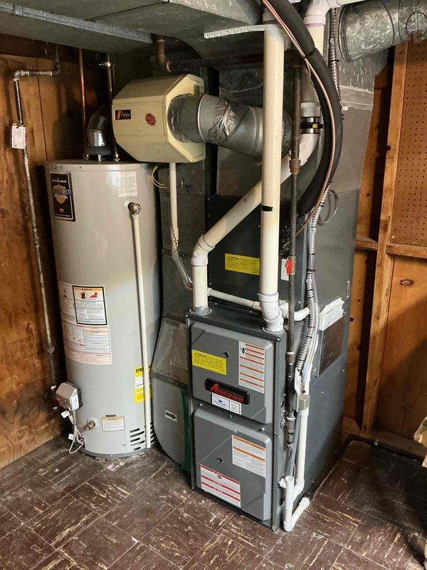 Completed comprehensive air conditioning tune-up on approximately six-year-old residential cooling system. Performed standard preventive maintenance procedures on outdoor condensing unit, including inspection of electrical connections, refrigerant levels, and fan operation to ensure optimal system performance for the cooling season.