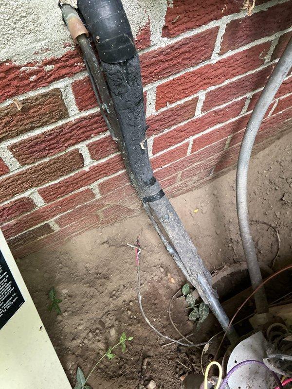 Responded to no cooling complaint on residential air conditioning system over 10 years old with indoor temperature not dropping below 83 degrees and compressor not running. Upon inspection, found outdoor condenser coil heavily obstructed with cottonwood seeds, dirt, and fibrous debris throughout the fins, severely restricting airflow and preventing proper heat rejection. Cleaned condenser coil, removed debris buildup, verified electrical connections, and restored system to normal operating condition with compressor running and proper cooling cycle established.