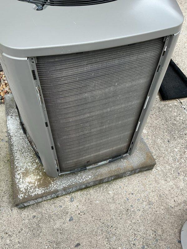 Completed comprehensive tune-up on 4-year-old outdoor HVAC unit. Performed electrical diagnostics using clamp meter, recording amperage readings at 54.1 amps to verify compressor performance within manufacturer specifications. Inspected condenser coils, capacitor connections, and all electrical components for proper operation and wear. Unit found to be functioning properly with no issues identified during inspection.