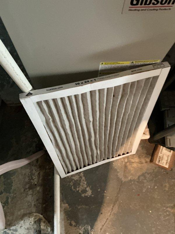 Completed preventive maintenance tune-up on Gibson air handler system with unknown age AC unit. Inspected indoor air handler unit, verified 16x24x1 air filter condition, and checked outdoor condensing unit. All components operational with no immediate issues identified during inspection.