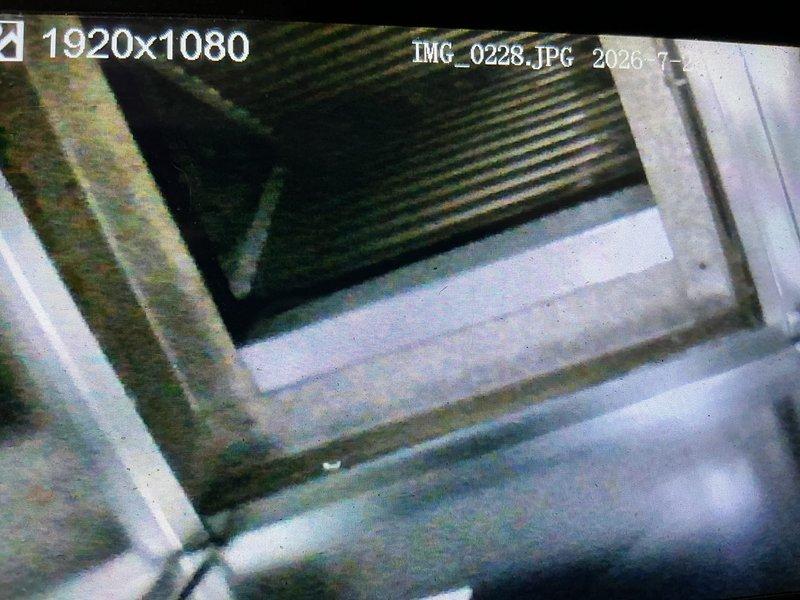 Performed comprehensive spring maintenance on 12-year-old air conditioning system. Inspected evaporator coil and heat exchanger assembly, noting accumulated dust and debris on coil fins and surrounding components. Completed standard preventive maintenance procedures including system inspection, component evaluation, and documentation of equipment condition through photographs for service records.