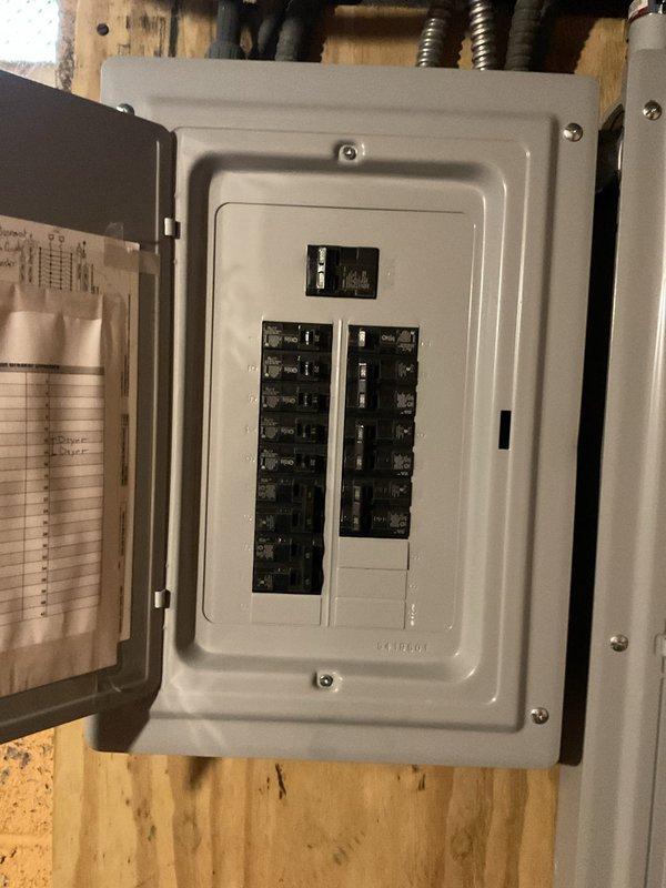Conducted on-site assessment for mini-split HVAC system installation at residential property. Evaluated existing electrical infrastructure, including main breaker panel with available capacity for new system connection, and documented current outdoor HVAC equipment configuration consisting of two existing condenser units with refrigerant line sets and wall-mounted covers. Assessment included verification of suitable mounting locations, electrical service compatibility, and optimal placement for indoor and outdoor mini-split components to provide efficient heating and cooling solution.