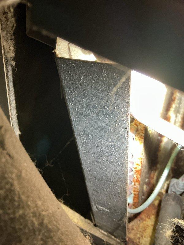 Performed preventative maintenance on residential air conditioning system. Accessed and thoroughly cleaned evaporator coil as requested to restore optimal heat transfer efficiency and airflow. Inspected ductwork and internal components, noting visible rust and corrosion on metal ductwork and structural supports indicating moisture exposure and age-related deterioration.