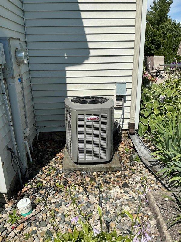 Completed preventative maintenance on 4-year-old Lennox air conditioning system. Addressed customer concern regarding insufficient cooling on second floor. Performed comprehensive tune-up including inspection of outdoor condenser unit and indoor furnace/air handler, verified refrigerant levels, checked electrical connections, cleaned components as needed, and tested system operation. All equipment found to be functioning within normal parameters. Customer opted to renew maintenance plan agreement and payment was collected via check.
