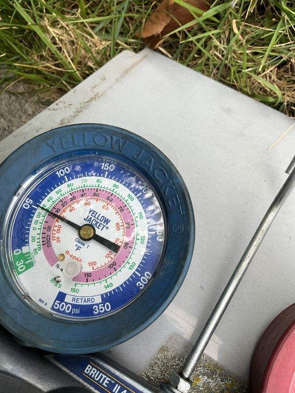 Responded to no cooling complaint on 9-year-old air conditioning system. Connected manifold gauge set to measure refrigerant pressures and diagnose system performance. Performed diagnostic evaluation to determine cause of inadequate cooling and assessed overall system operation.