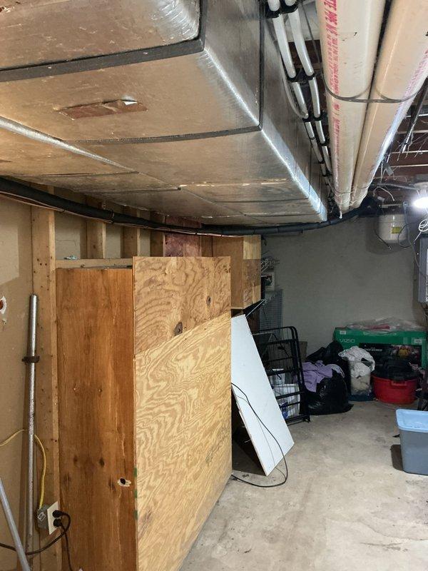 Completed full HVAC system installation including a 14 SEER single-stage condenser unit mounted on new equipment pad with disconnect and whip. Installed upflow cased evaporator coil with required sheet metal transitions and new 7/8" x 50' lineset connecting outdoor and indoor components. Replaced existing thermostat with new unit and verified proper system operation, refrigerant charge, and airflow throughout. All equipment covered under 10-year parts and labor warranty.