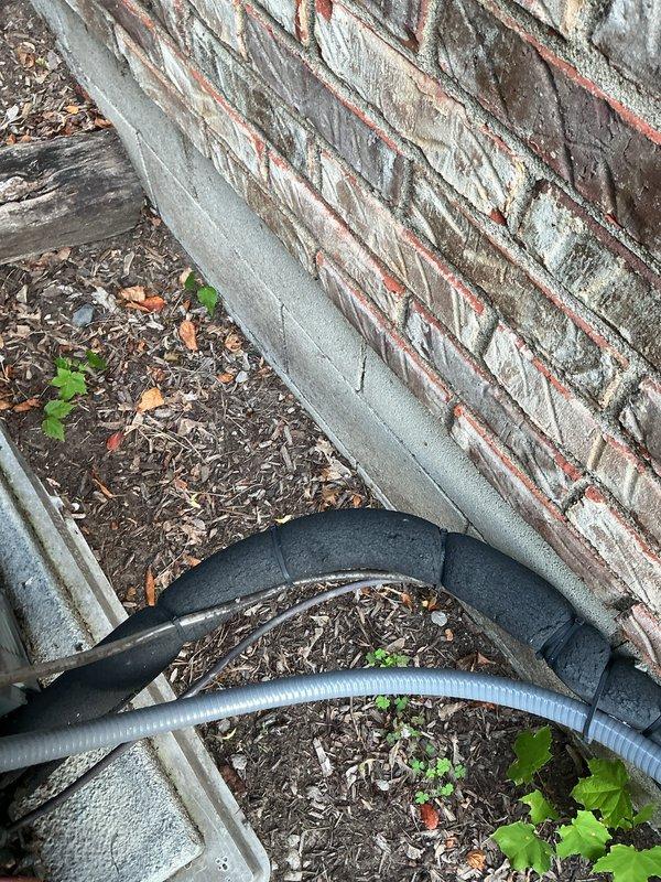 Completed routine cooling maintenance on a 4-year-old air conditioning system during a scheduled service window. Performed electrical diagnostics using clamp meter, measuring compressor amperage at 16.82 amps to verify proper system operation and component performance. Inspected exterior unit components, refrigerant lines, and electrical connections; all systems operating within normal parameters with no immediate repairs required.