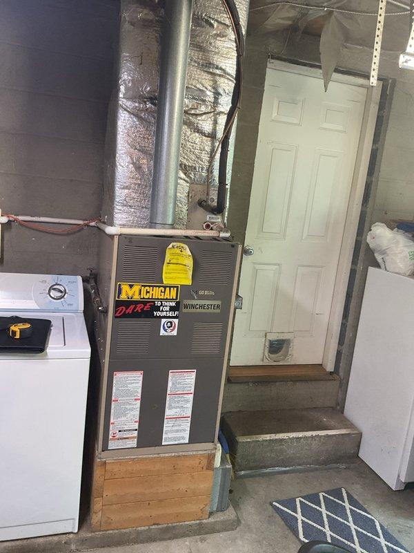 Completed comprehensive HVAC system replacement estimate for residential property. Evaluated existing furnace unit located in basement utility area and outdoor air conditioning condenser unit positioned against exterior wall with landscaping. Assessed current equipment condition, measured system specifications, documented installation environment including ductwork configuration and electrical service connections, and captured detailed photos of both indoor and outdoor components to provide accurate replacement system recommendations and pricing options for complete heating and cooling system upgrade.