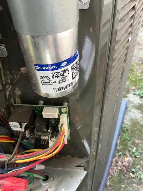 Performed comprehensive air conditioning tune-up on a 5-year-old system. Inspected capacitor, electrical connections, and refrigerant lines; verified proper system operation and pressures. All components found to be functioning within normal parameters with routine dust accumulation noted.
