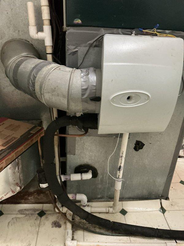 Completed comprehensive cooling system tune-up and maintenance on residential HVAC unit. Performed thorough inspection of indoor air handler components including evaporator coil and air filtration system, verified proper airflow through multi-panel filter assembly, and documented equipment condition with photographic records showing clean coil fins and properly secured ductwork connections.