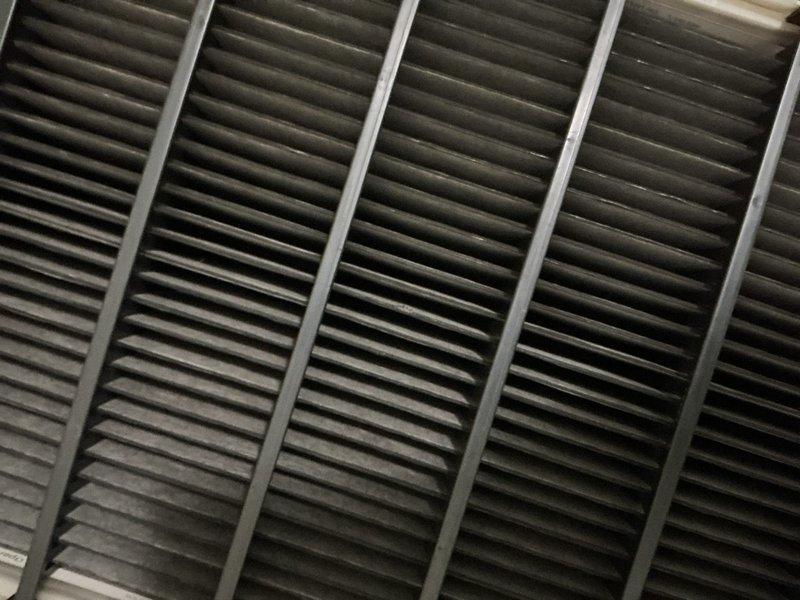 Completed comprehensive cooling system tune-up and maintenance on residential HVAC unit. Performed thorough inspection of indoor air handler components including evaporator coil and air filtration system, verified proper airflow through multi-panel filter assembly, and documented equipment condition with photographic records showing clean coil fins and properly secured ductwork connections.