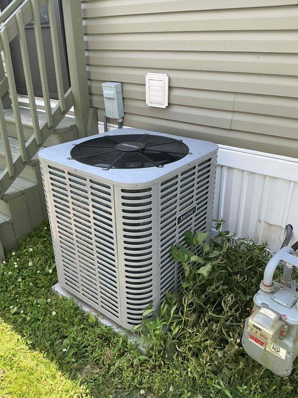Completed comprehensive tune-up on eight-year-old residential air conditioning system. Performed thorough inspection of outdoor condenser unit, checked electrical connections at capacitor and contactor, verified proper wire terminations, and confirmed all components operating within normal parameters. System tested and found to be functioning properly with no deficiencies noted.