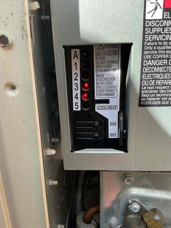 Responded to no cooling or heating complaint on 9-year-old mini split system. Upon arrival, performed diagnostic inspection of indoor and outdoor units. Examined refrigerant lines showing significant dirt and grime accumulation. Inspected control board and found two red indicator lights illuminated, suggesting fault condition. Tested electrical connections and verified power supply to system. Evaluated control switches and heat/cool mode settings. Cleaned refrigerant line connections and assessed system for potential refrigerant leak or compressor failure. Documented equipment condition with photos of soiled refrigerant lines and control panel fault indicators for warranty and follow-up purposes.