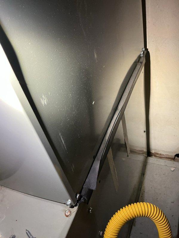 Responded to service call for 12-year-old air conditioning system running continuously with no airflow. Upon inspection, discovered severely clogged air filter restricting airflow through the system, causing the unit to operate without delivering conditioned air to the living space. Removed and replaced dirty 16x25x1 pleated air filter that showed significant dust and debris accumulation. Observed condensation buildup on ductwork and plenum surfaces, indicating proper system operation once airflow was restored. Verified blower operation and confirmed adequate airflow delivery throughout the system after filter replacement. System now cooling properly with normal airflow.