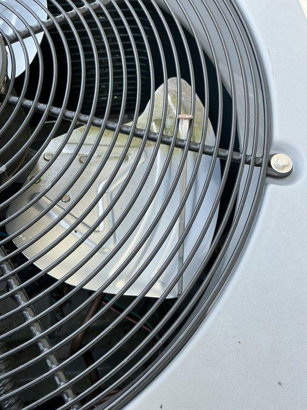 Responded to no-cooling call on 9-year-old American Standard air conditioning system. Customer reported that smart thermostat tripped breaker, and after resetting, outdoor condensing unit failed to operate. Upon arrival, inspected outdoor unit and confirmed fan motor and compressor were not energizing. Verified proper power supply to unit and checked electrical connections. Reset tripped breaker and tested system operation. Condensing unit restored to normal operation with fan blade spinning freely and compressor running. Verified adequate airflow through condenser coil and confirmed unit cycling properly on thermostat demand. System operating within normal parameters at time of departure.